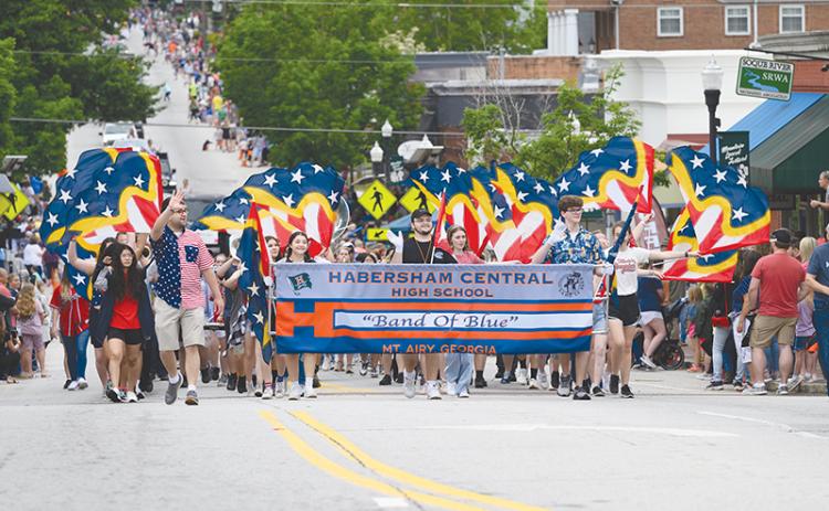 Habersham Central’s Band of Blue marched with an American theme for the Mountain Laurel Parade, with stars and stripes streamers twirling through the heart of Clarkesville. ZACH TAYLOR/Special