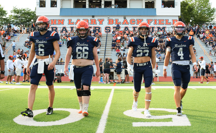 Habersham Central captains (from left) Jonah Wilson, Davey Sanders, Carter Barrett and Carson Parker come to the middle of the field for the preseason game against East Hall. The Raiders kick it off for real on Friday night at home against Stephens County. TOM ASKEW/Special
