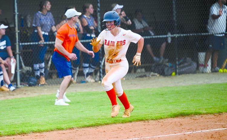 Emily Diffenderfer rounds third on her way to scoring the first run after an RBI base hit from Hannah Odum. ZACH TAYLOR/Special