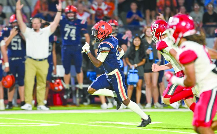 Habersham Central’s Somdee Satiphone Jr. takes a kick return to the house on Friday night against Stephens County. TOM ASKEW/Special
