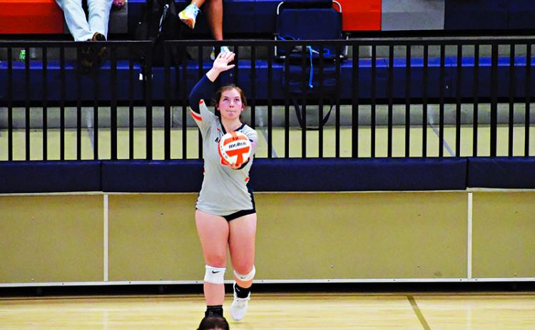 Habersham Central’s Brooke Blackburn gets ready to serve during a recent home match. LANG STOREY/Staff