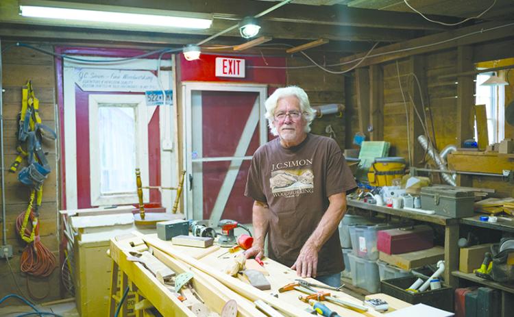 Joel Simon of J.C. Simon Fine Woodworking stands in his shop in Clarkesville. ZACH TAYLOR/Special