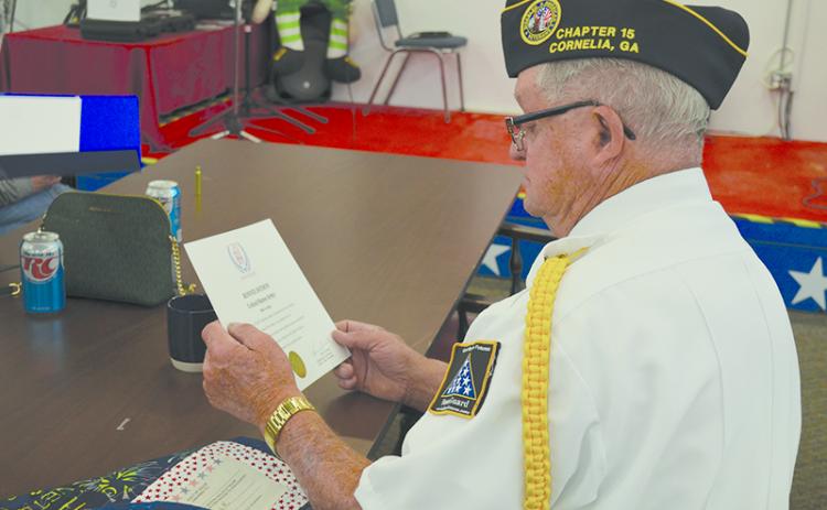 Habersham County veteran Ronnie Dotson reviews the paperwork that came with his Quilt of Honor. Veteran leaders have worked hard to honor those who have served and now are seeking to improve their healthcare. FILE