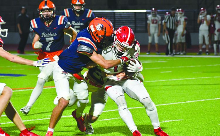 Habersham Central’s Zeke Whittington was one of several Raiders who asserted themselves on defense in Friday night’s win over Forsyth Central. LANG STOREY/Staff