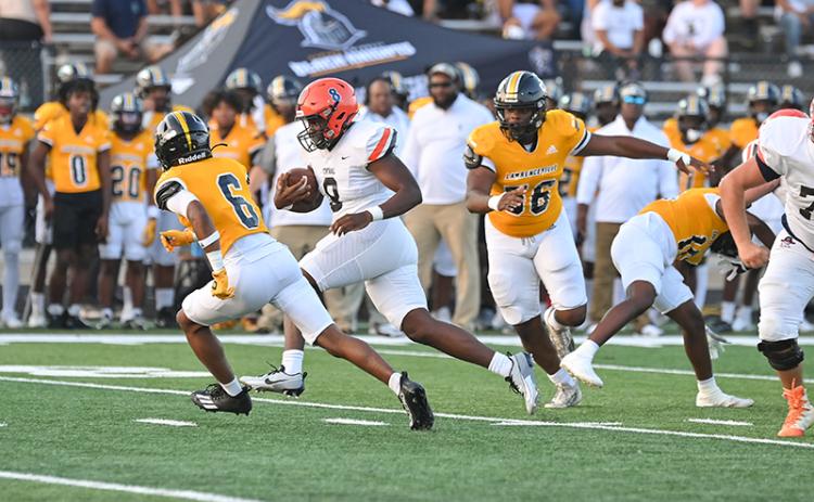Habersham Central’s Antonio Cantrell runs into the open field against Central Gwinnett on Friday night. Cantrell had his first 100-yard rushing game in the win. TOM ASKEW/Special
