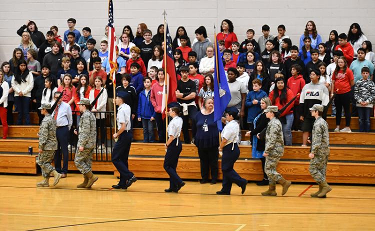 Habersham Central High School Junior ROTC marches for the Presentation of Colors at South Habersham Middle School’s Veterans Day program. JULIANNE AKERS/Staff