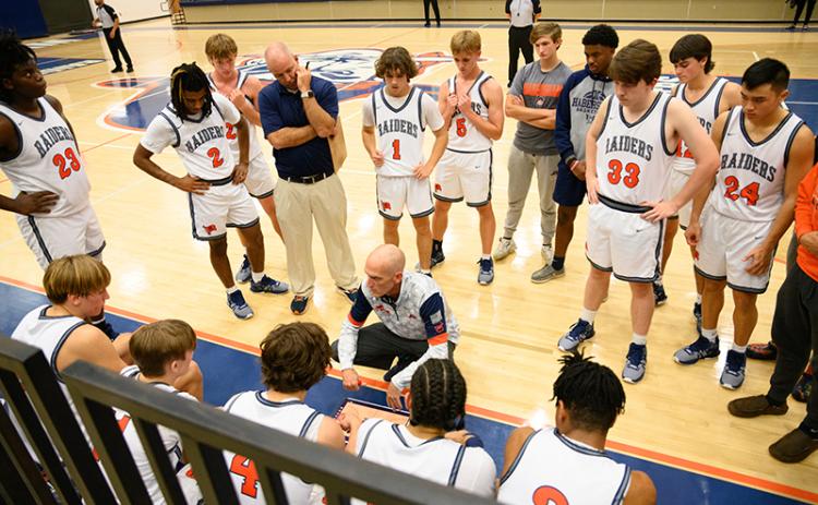 Habersham Central coach Tommy Yancey talks to the Raiders in a time out during their opening game last week. ZACH TAYLOR/Special
