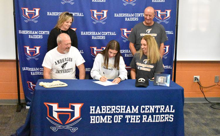 Habersham Central’s Kyia Barrett is joined by her parents at her signing ceremony for Anderson University basketball on Wednesday. Shown are (back row, from left) Deborah Barrett and Randy Edwards. Front row are (from left) Terry Barrett, Kyia and Tenille Edwards. MATTHEW OSBORNE/Staff