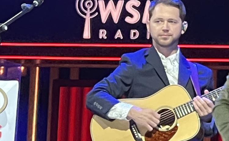 Clint Coker plays guitar at the Grand Ole Opry with bluegrass group Dailey & Vincent on Nov. 26.  Coker is a Habersham County native and lives in Demorest where he teaches guitar lessons and travels with bluegrass groups. SUBMITTED