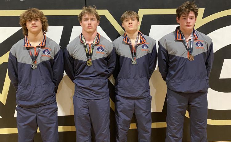 VIKING RAIDERS - Habersham Central’s boys wrestling team brought home four medals from the Viking Christmas Clash, including Justin Whitney (1st), Eli Thornton (2nd), Westin Lakey (2nd) and Ryan McDonald (3rd). The Raiders missed four weight classes and still finished fourth out of 12 teams. SUBMITTED
