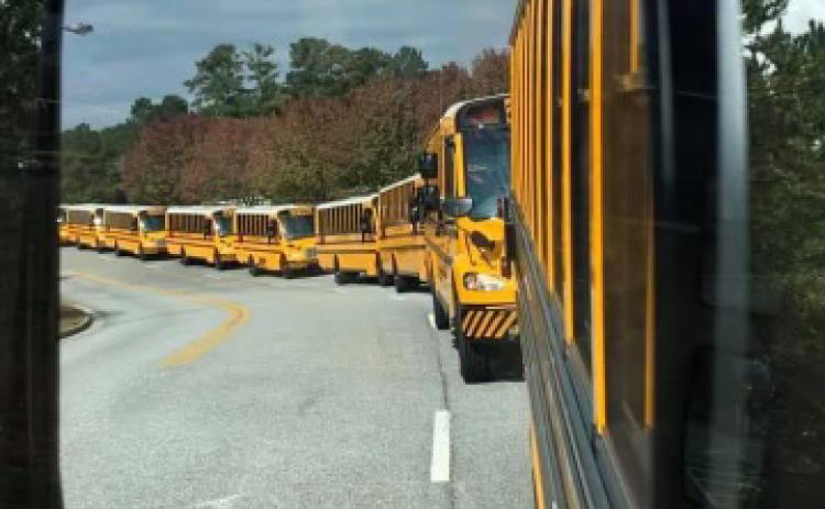 Habersham County School buses lineup to pick up students. SUBMITTED