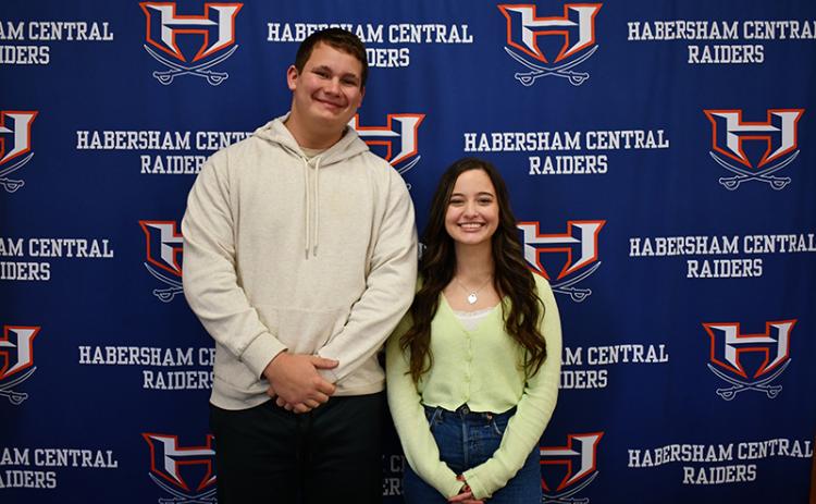 Brad Chosewood and Georgia Kerr stand for a photo after being announced as the class of 2024 salutatorian and valedictorian. JULIANNE AKERS/Staff