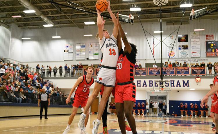 Habersham Central’s Judge Wilbanks fights through the lane for two points against Jackson County last week. The Raiders went to Shiloh Tuesday and avenged a previous loss against the region’s top team. ZACH TAYLOR/Special