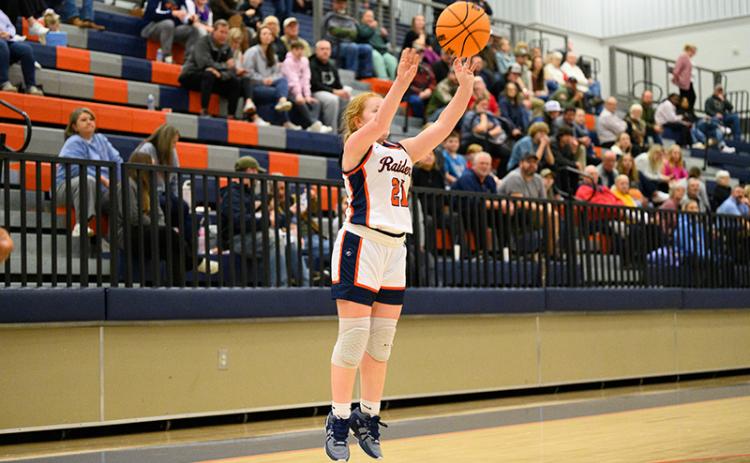 Habersham Central’s Karah Dean shoots a 3-pointer after receiving the swing pass from Kyia  Barrett during Wednesday night’s region opener at home. Dean put up 11 shots from deep in the Lady Raiders’ win. ZACH TAYLOR/Special