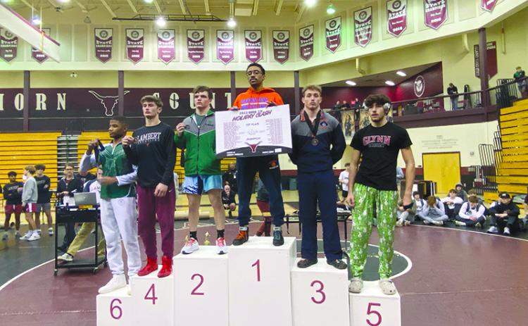 Habersham Central’s Justin Whitney got on the podium in third place in the 157-pound class at a tournament that featured 39 schools. SUBMITTED