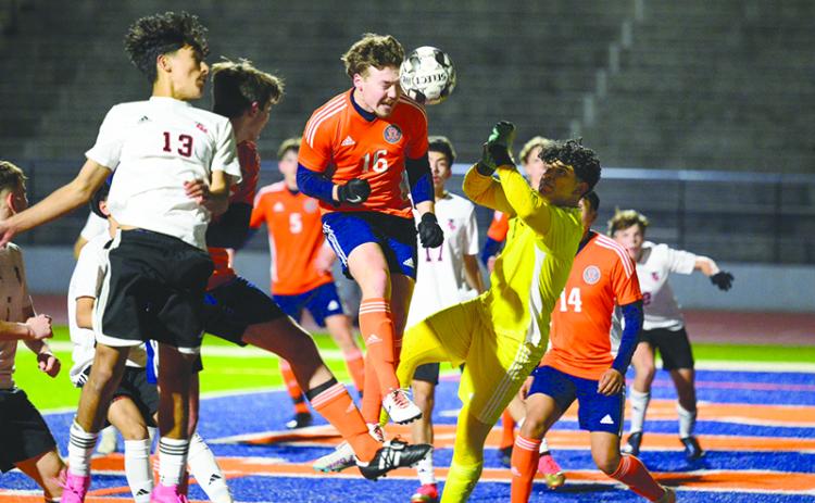 Habersham Central’s Brody Tyree lands the header for a Raiders goal during  Tuesday night’s season opener. ZACH TAYLOR/Special