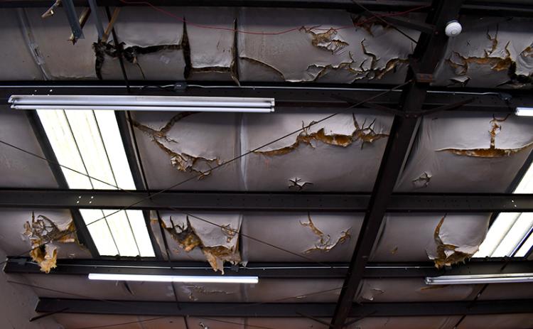 Ceilings in the apparatus bay at  Station 12 on  Duncan Bridge Road are falling apart. This type of  disrepair is a scene  common to stations around the county. JULIANNE AKERS/Staff