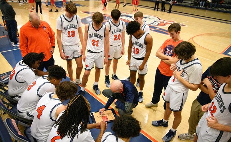Habersham Central coach Tommy Yancey instructs his team during a time out. ZACH TAYLOR/Special
