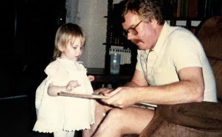 Pops reads with Kenz way back in the day.