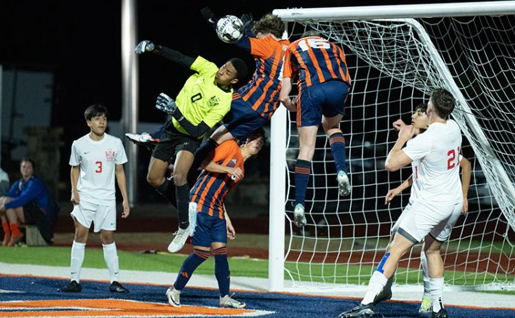 Habersham Central’s Brody Tyree and Camden Meads collide in midair after going for a header Tuesday night. ZACH TAYLOR/Special
