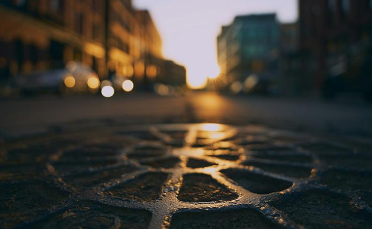 Manhole cover photo by Korie Jenkins on UNSPLASH.