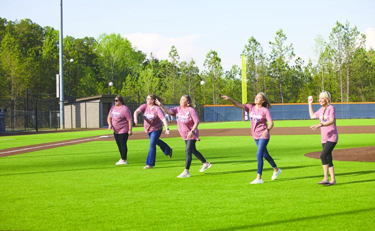 Habersham Central baseball’s senior moms throw out the first pitch Monday night, including (from left) Brandi Burrell, Stacey Gailey, April Bass, Amber Chastain and Kelly Gunn. KYIA BARRETT/Special
